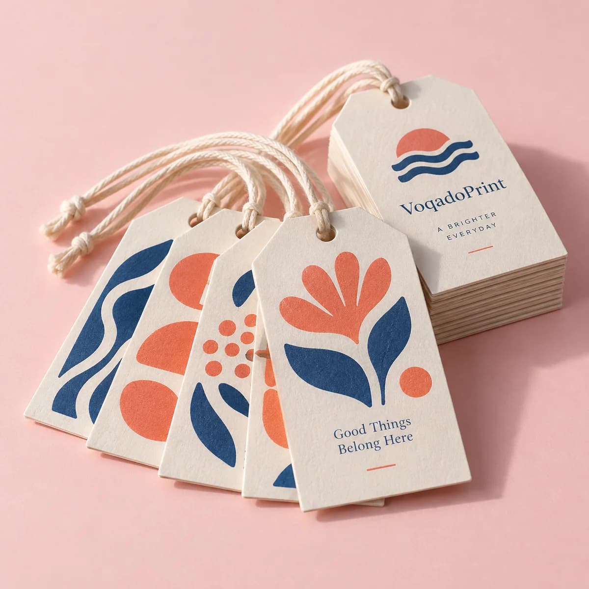 Hang tags: original Voqado product visualization; styling and props are illustrative