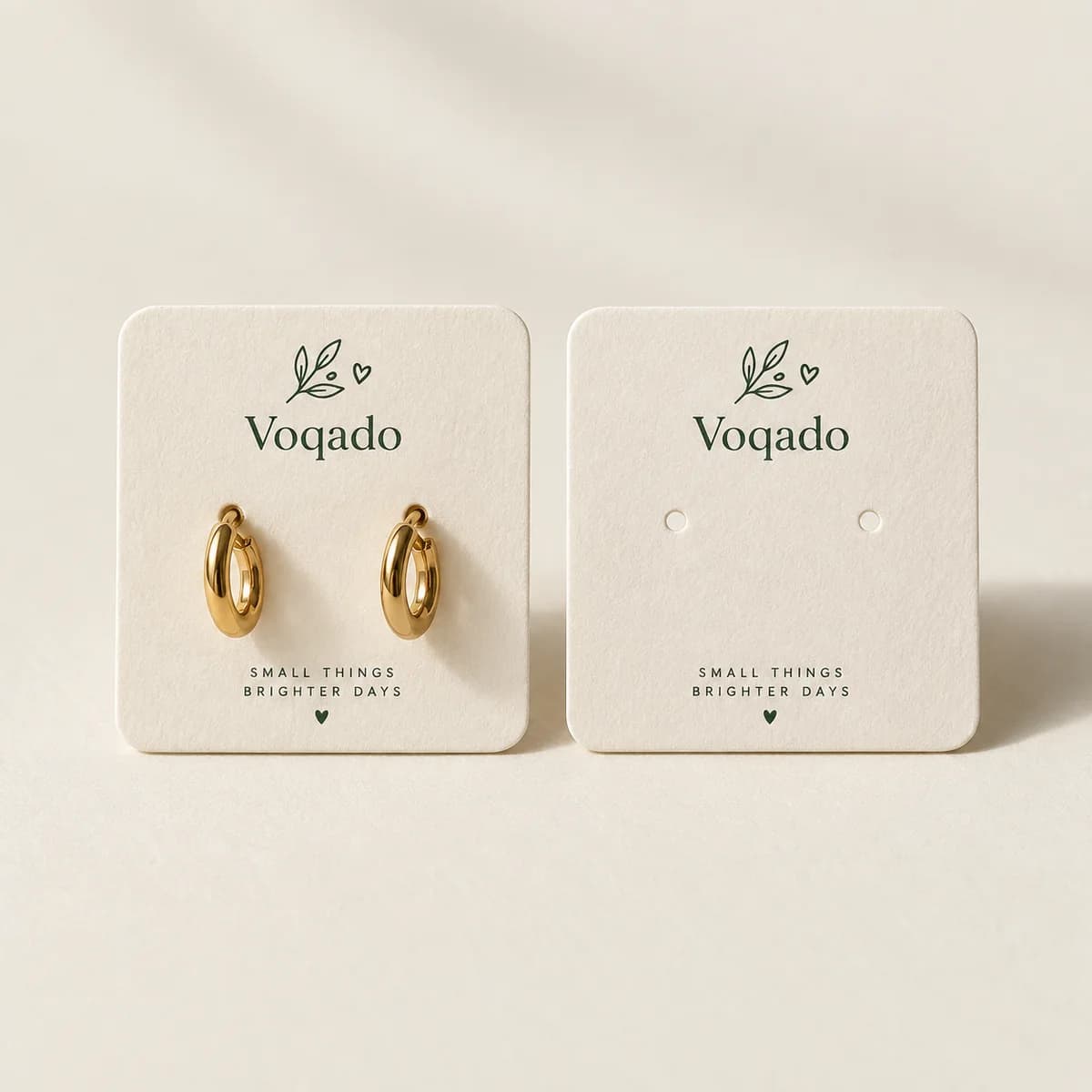 Jewelry tags: original Voqado product visualization; styling and props are illustrative