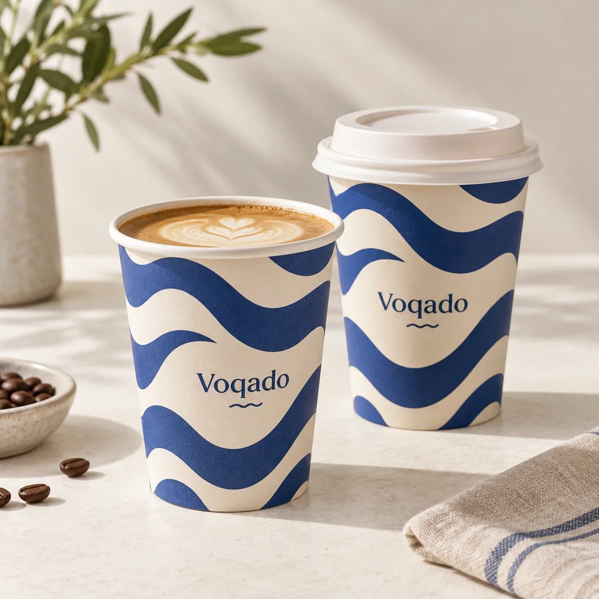 Paper cups from the Voqado catalog, shown as a design concept.