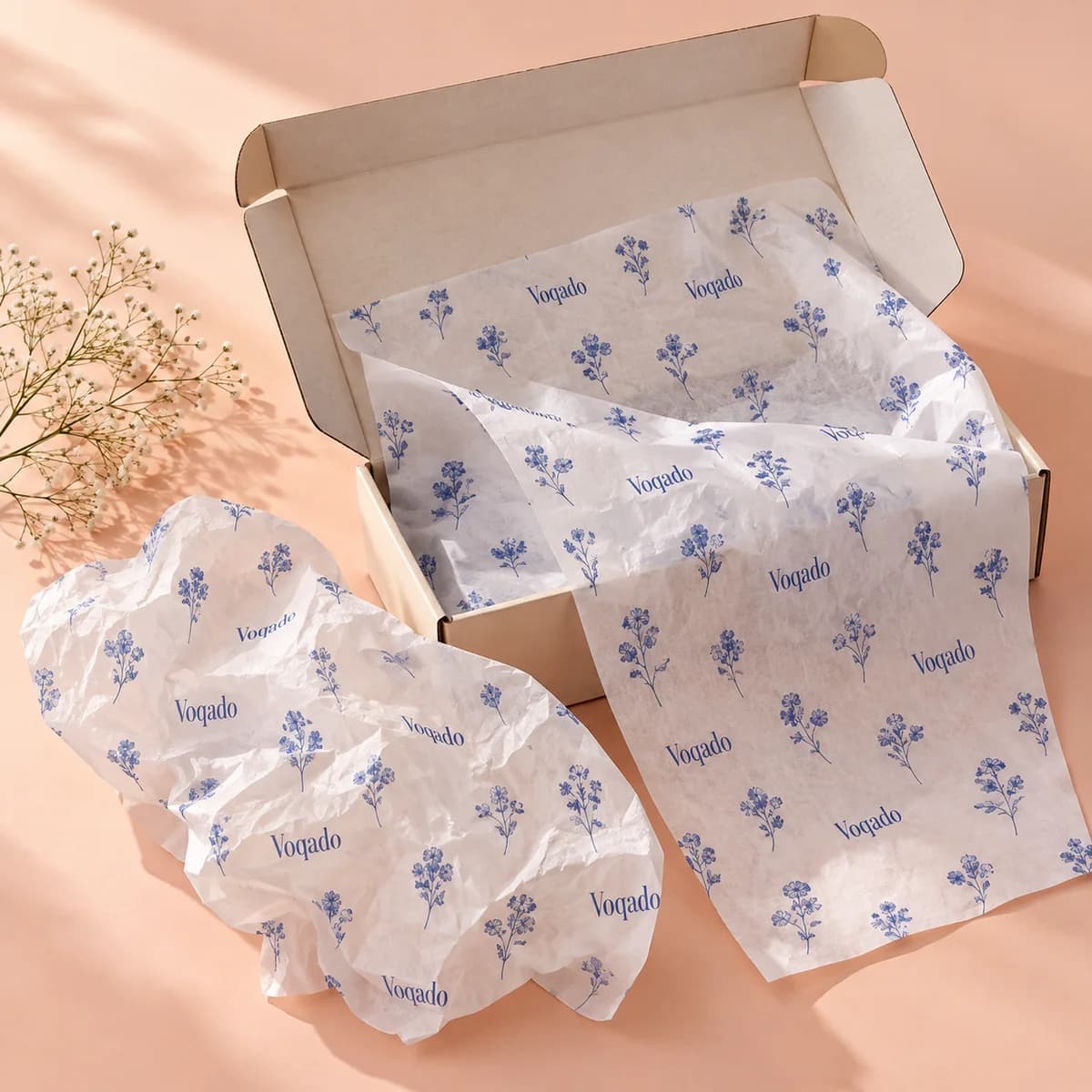 Tissue paper: original Voqado product visualization; styling and props are illustrative