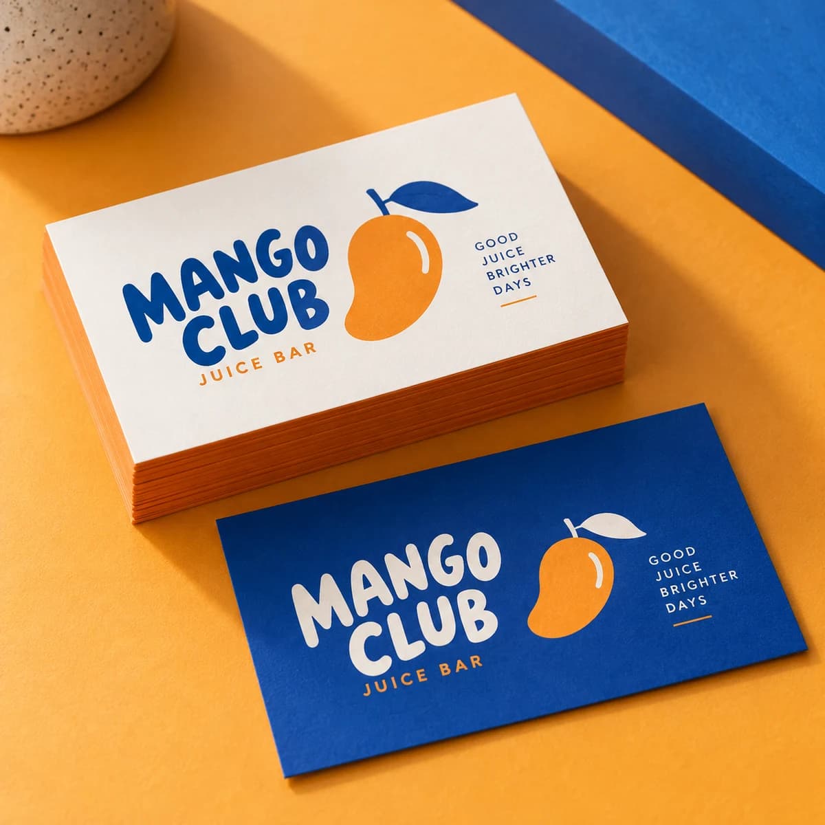 Standard business cards: MANGO CLUB fictional playful neighborhood juice bar, studio composition. Illustrative design concept.